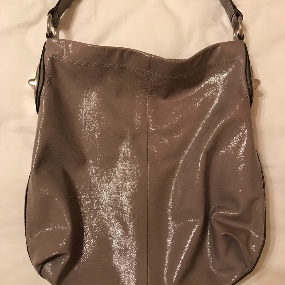 Gray and silver Coach purse